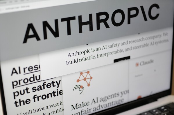 The image shows a computer screen displaying content related to Anthropic, an AI safety research company, with bold text reading "ANTHROPIC" and additional text